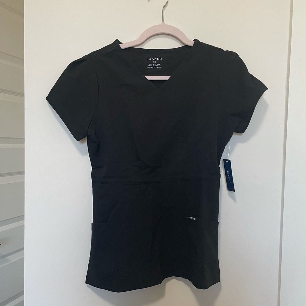 Brand new with tags Jaanuu XS black scrub top!